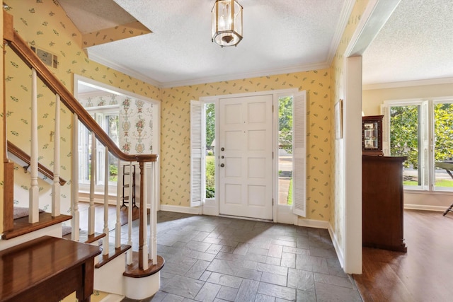 8741 Montavesta Dr, Germantown, TN 38139 - foyer entrance with ornamental molding, a textured ceiling, baseboards, stairs, and wallpapered walls