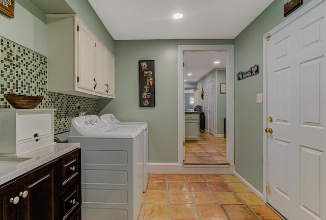 9040 Ashmere Dr, Germantown, TN 38139 - laundry room with cabinet space, separate washer and dryer, recessed lighting, baseboards, and light tile patterned flooring