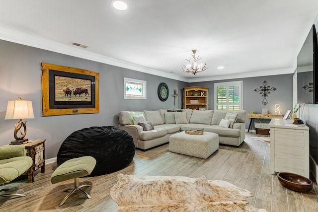 9040 Ashmere Dr, Germantown, TN 38139 - living room featuring a chandelier, crown molding, light wood-style floors, recessed lighting, and baseboards
