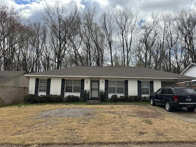 4285 Ann Arbor Ln, Memphis, TN 38128 - ranch-style home featuring a front yard and a carport