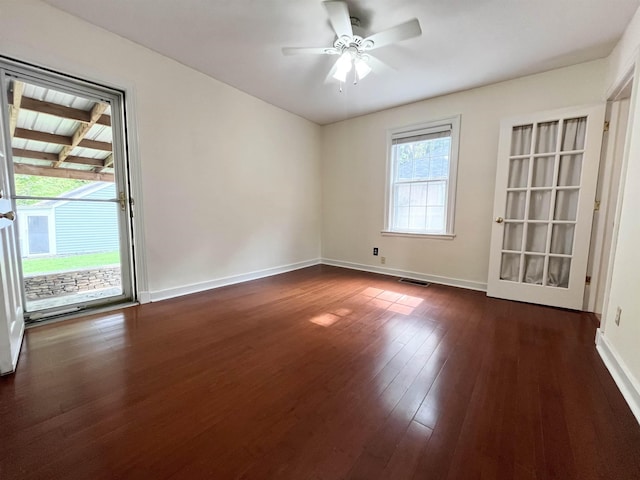 3529 Johnwood Dr, Memphis, TN 38122 - unfurnished room featuring a ceiling fan, baseboards, and dark wood-style floors