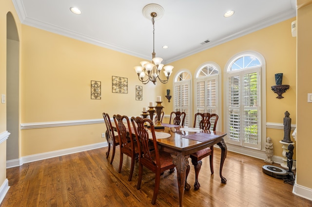 1073 Woodland Glen Dr, Cordova, TN 38018 - dining area with a chandelier, crown molding, wood finished floors, recessed lighting, and baseboards