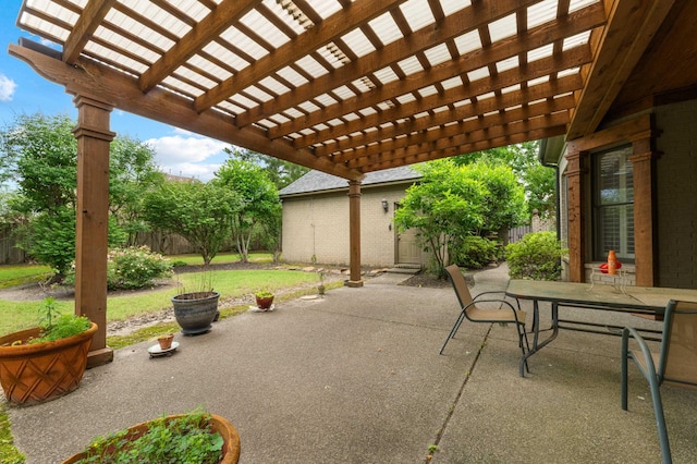 1073 Woodland Glen Dr, Cordova, TN 38018 - fenced backyard featuring a pergola, outdoor dining space, and a patio