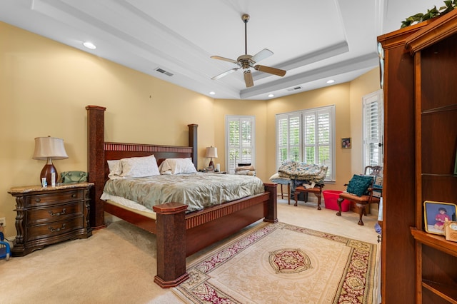 1073 Woodland Glen Dr, Cordova, TN 38018 - bedroom featuring light colored carpet, a tray ceiling, recessed lighting, and ceiling fan