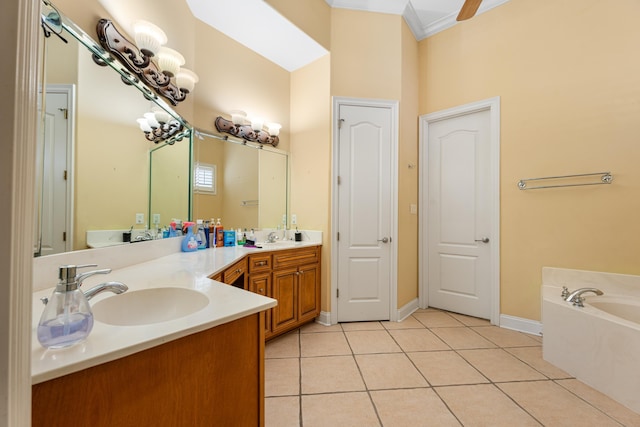 1073 Woodland Glen Dr, Cordova, TN 38018 - full bathroom featuring double vanity, a bath, tile patterned flooring, baseboards, and ornamental molding