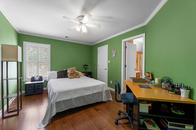 1073 Woodland Glen Dr, Cordova, TN 38018 - bedroom with crown molding, dark wood-type flooring, baseboards, and ceiling fan