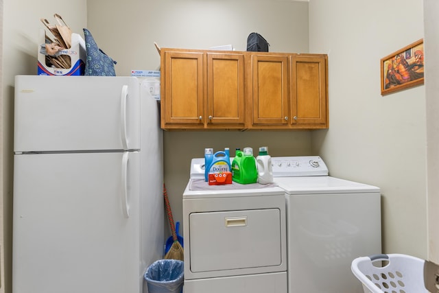1073 Woodland Glen Dr, Cordova, TN 38018 - laundry area with washing machine and clothes dryer and cabinet space
