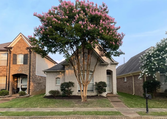1360 Broadstone Cv, Cordova, TN 38016 - view of front of home with a front lawn and brick siding