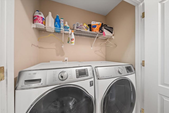1360 Broadstone Cv, Cordova, TN 38016 - laundry area with washing machine and dryer