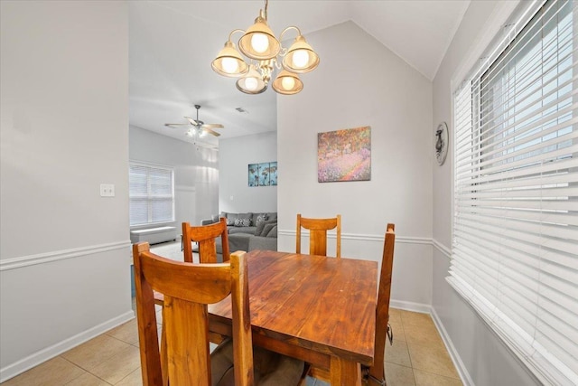 1360 Broadstone Cv, Cordova, TN 38016 - dining space featuring light tile patterned flooring, lofted ceiling, a chandelier, ceiling fan, and baseboards