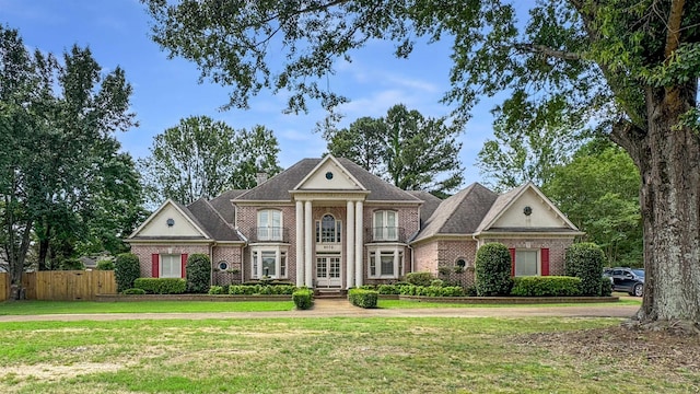 9573 Wolf River Blvd, Germantown, TN 38139 - greek revival house featuring brick siding and french doors