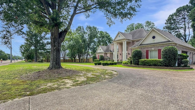 9573 Wolf River Blvd, Germantown, TN 38139 - neoclassical / greek revival house featuring curved driveway and brick siding