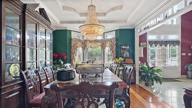 9573 Wolf River Blvd, Germantown, TN 38139 - dining space featuring a chandelier, ornamental molding, and a tray ceiling