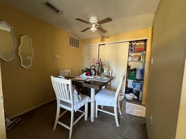 6764 Quail Hollow Ct Unit 2, Memphis, TN 38120 - carpeted dining area with ceiling fan and a textured ceiling