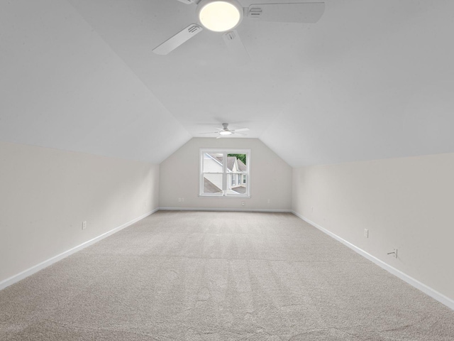 712 Lawncrest Cv, Collierville, TN 38017 - bonus room with ceiling fan, light colored carpet, baseboards, and lofted ceiling