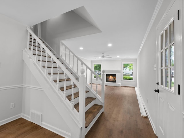 712 Lawncrest Cv, Collierville, TN 38017 - staircase with a warm lit fireplace, recessed lighting, baseboards, wood finished floors, and a ceiling fan