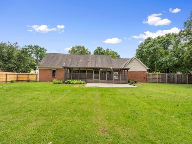712 Lawncrest Cv, Collierville, TN 38017 - back of house featuring a sunroom, brick siding, and a patio area