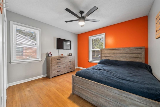 3266 Dothan St, Memphis, TN 38118 - bedroom with light wood-style flooring, baseboards, and ceiling fan