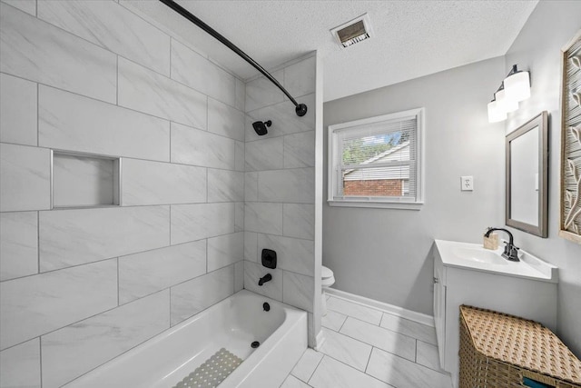 3266 Dothan St, Memphis, TN 38118 - full bathroom with  shower combination, toilet, vanity, a textured ceiling, and baseboards