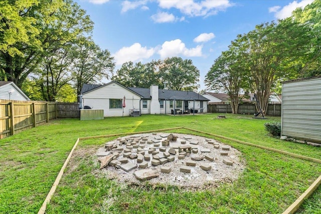 3266 Dothan St, Memphis, TN 38118 - view of yard featuring a fire pit