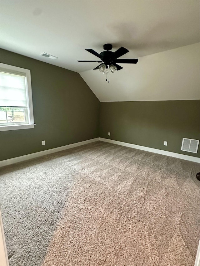4049 Courtyard Dr, Southaven, MS 38672 - bonus room featuring vaulted ceiling, baseboards, carpet, and ceiling fan