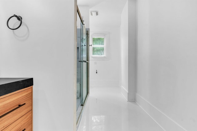 1721 Nelson Ave, Memphis, TN 38114 - full bathroom featuring tile patterned floors and a shower with door