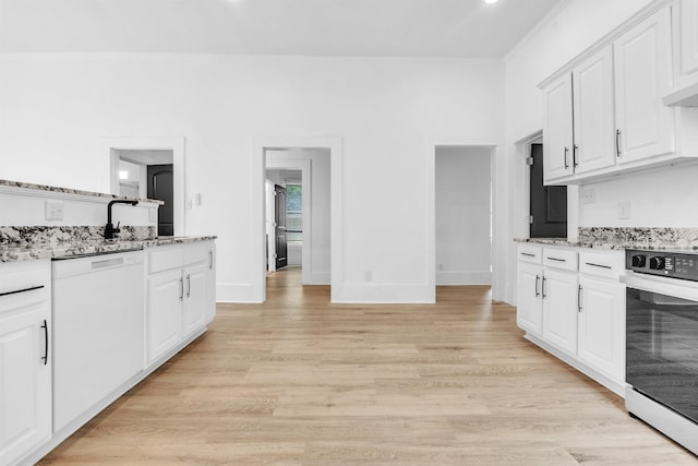 1721 Nelson Ave, Memphis, TN 38114 - kitchen featuring stainless steel stove, white dishwasher, white cabinetry, ornamental molding, and light wood-style flooring