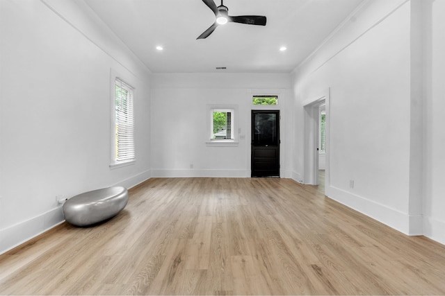 1721 Nelson Ave, Memphis, TN 38114 - unfurnished living room featuring healthy amount of natural light, a ceiling fan, light wood-type flooring, baseboards, and recessed lighting