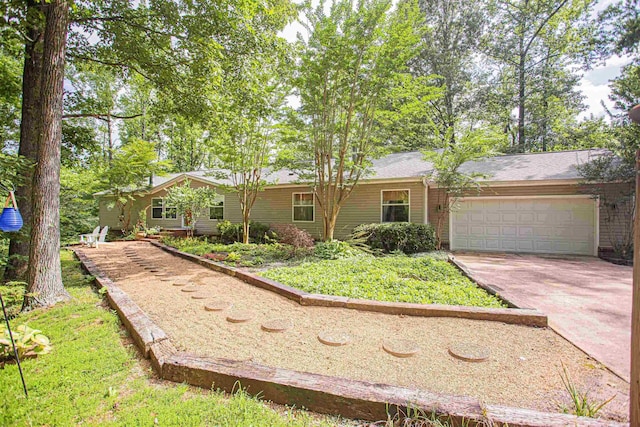 67 Walker Field Ln, Munford, TN 38058 - ranch-style house featuring an attached garage and concrete driveway
