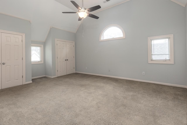 1570 Eastmoreland Ave, Memphis, TN 38104 - unfurnished bedroom with carpet flooring, high vaulted ceiling, baseboards, and a ceiling fan