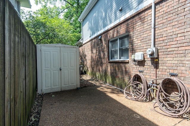 1570 Eastmoreland Ave, Memphis, TN 38104 - view of home's exterior with brick siding and central AC