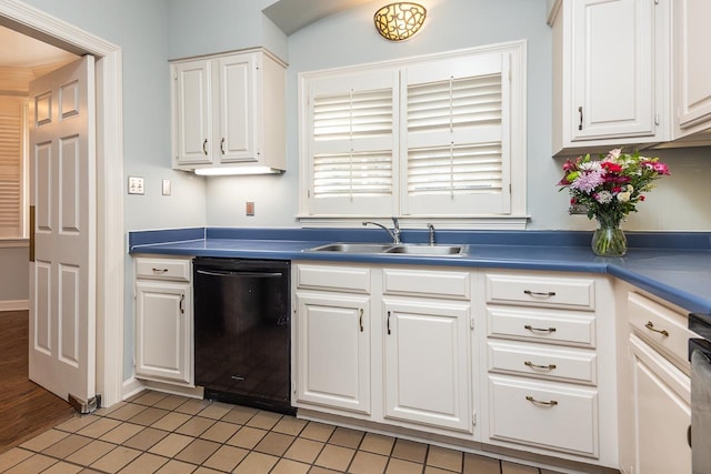 1570 Eastmoreland Ave, Memphis, TN 38104 - kitchen featuring dishwasher, a sink, white cabinets, and light tile patterned flooring