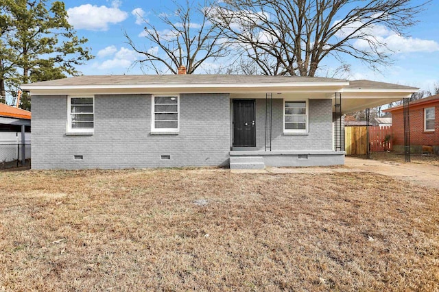 3314 Frayser View Dr, Memphis, TN 38127 - view of front of home featuring crawl space, brick siding, and a chimney