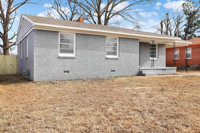 3314 Frayser View Dr, Memphis, TN 38127 - back of house with crawl space, brick siding, a porch, and a chimney