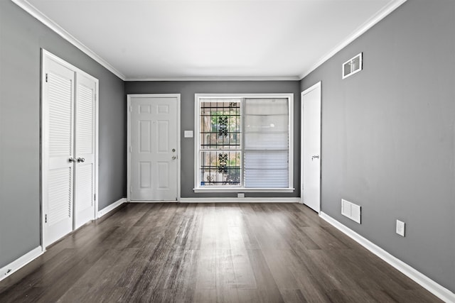4025 Bishops Bridge Rd, Memphis, TN 38118 - foyer with dark wood-style flooring, baseboards, and ornamental molding