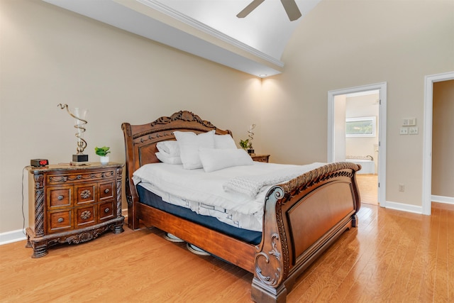 2660 Dibrell Trail Dr, Collierville, TN 38017 - bedroom featuring wood finished floors, baseboards, ensuite bath, ceiling fan, and high vaulted ceiling