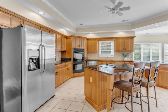 2660 Dibrell Trail Dr, Collierville, TN 38017 - kitchen featuring black appliances, light tile patterned floors, crown molding, a sink, and decorative backsplash