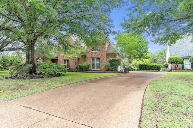 2660 Dibrell Trail Dr, Collierville, TN 38017 - view of front of house featuring brick siding and a front lawn