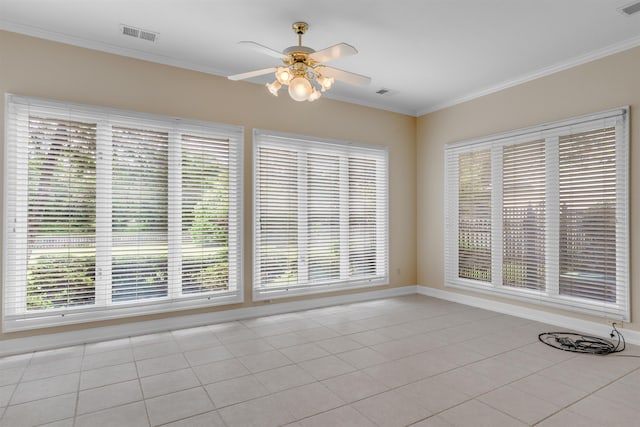 2660 Dibrell Trail Dr, Collierville, TN 38017 - empty room with crown molding, ceiling fan, plenty of natural light, baseboards, and light tile patterned flooring