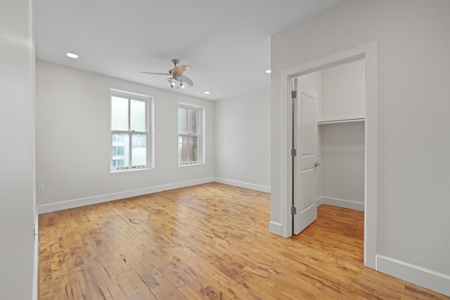 123 Court Ave Unit 401, Memphis, TN 38103 - unfurnished bedroom featuring light wood-type flooring, baseboards, and recessed lighting