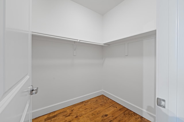 123 Court Ave Unit 401, Memphis, TN 38103 - spacious closet featuring wood finished floors