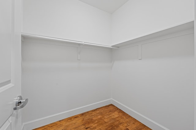 123 Court Ave Unit 401, Memphis, TN 38103 - walk in closet featuring wood finished floors