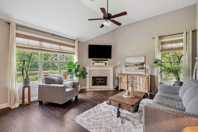 125 Mallard Ln, Rossville, TN 38066 - living area featuring healthy amount of natural light, ceiling fan, a fireplace with flush hearth, dark wood-type flooring, and high vaulted ceiling