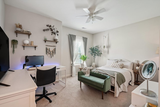 125 Mallard Ln, Rossville, TN 38066 - bedroom featuring a desk, light colored carpet, ceiling fan, and baseboards