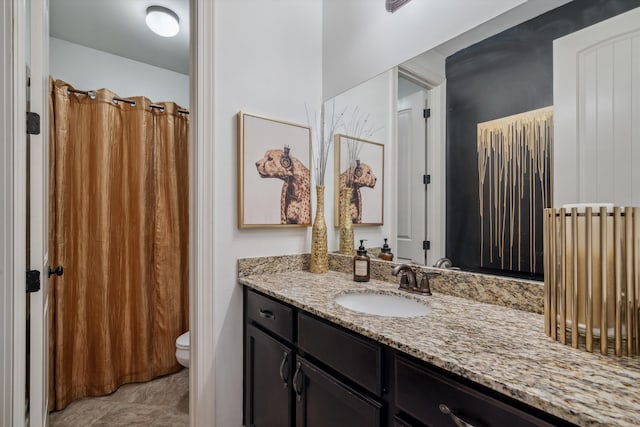 125 Mallard Ln, Rossville, TN 38066 - bathroom with vanity, toilet, and curtained shower