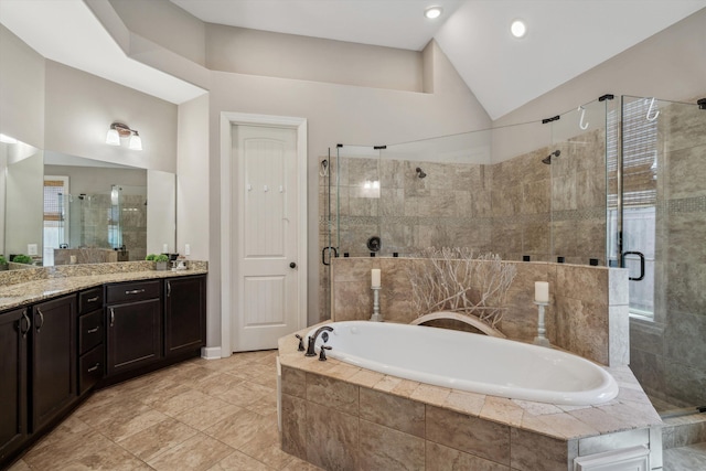 125 Mallard Ln, Rossville, TN 38066 - full bathroom featuring a stall shower, vanity, a bath, lofted ceiling, and tile patterned floors