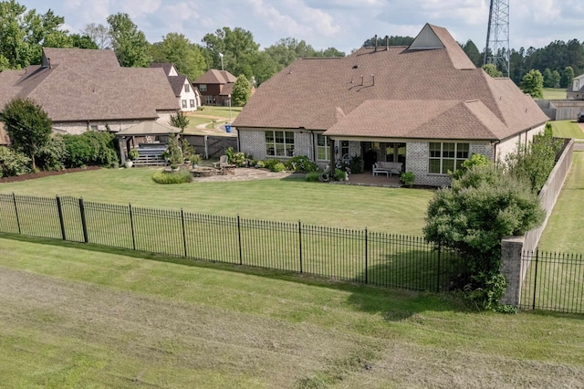 125 Mallard Ln, Rossville, TN 38066 - back of house with a gazebo, a patio area, brick siding, and a shingled roof