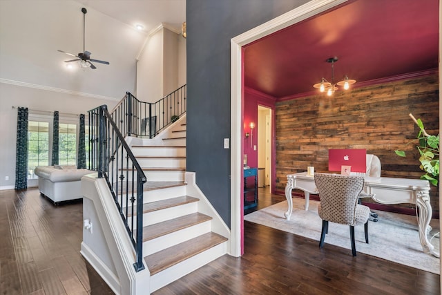 125 Mallard Ln, Rossville, TN 38066 - stairway with wooden walls, a ceiling fan, ornamental molding, wood finished floors, and high vaulted ceiling