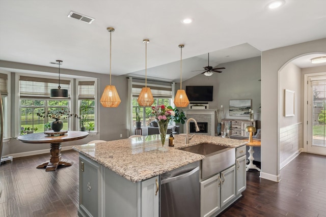 125 Mallard Ln, Rossville, TN 38066 - kitchen with stainless steel dishwasher, a sink, dark wood-type flooring, plenty of natural light, and recessed lighting