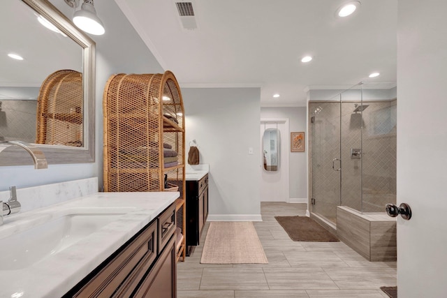5543 Walnut Grove Rd, Memphis, TN 38120 - full bath featuring crown molding, a shower stall, two vanities, recessed lighting, and baseboards